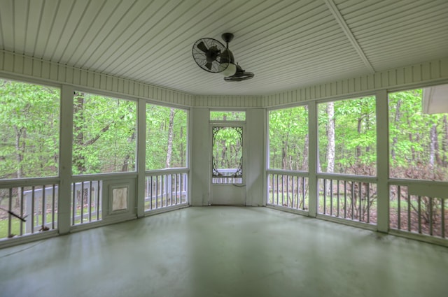 unfurnished sunroom with plenty of natural light