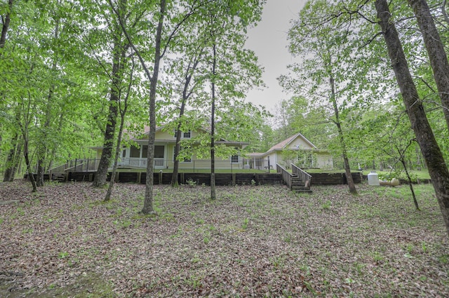 view of yard featuring a deck