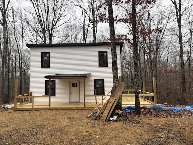 view of front of house with a wooden deck