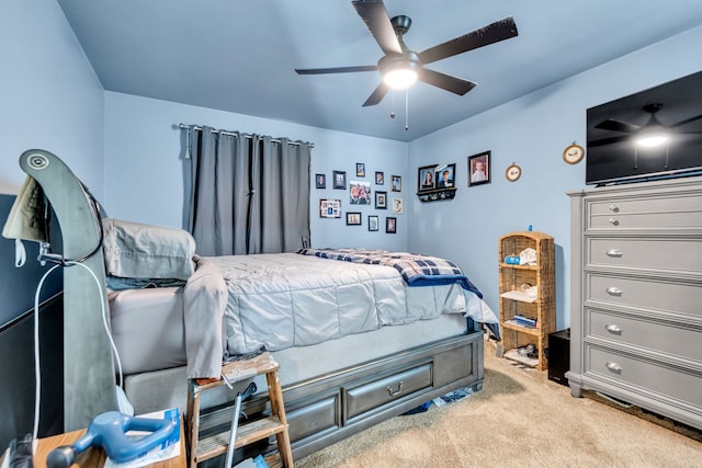 bedroom with light carpet and ceiling fan