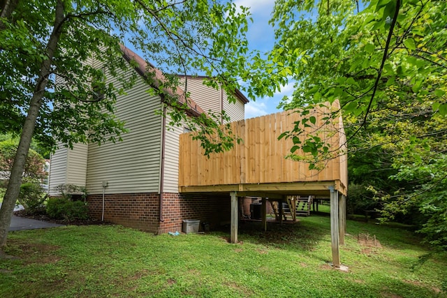 view of home's exterior featuring a yard