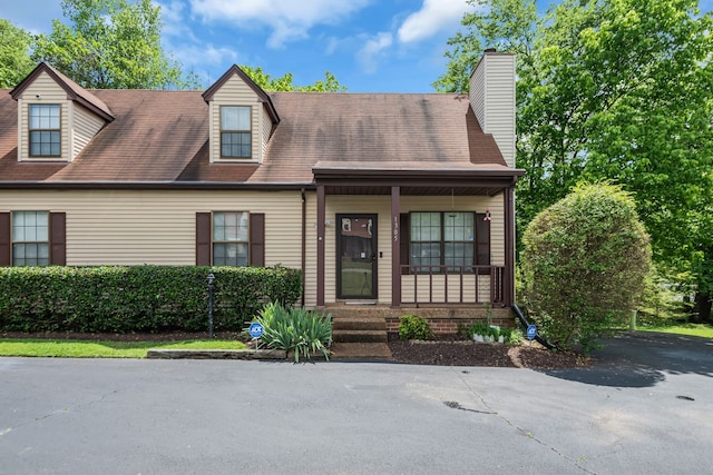 view of new england style home