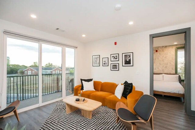 living room featuring dark hardwood / wood-style floors