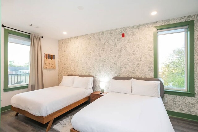 bedroom with wood-type flooring