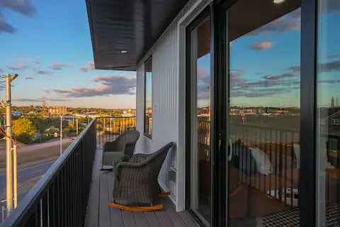 view of balcony at dusk