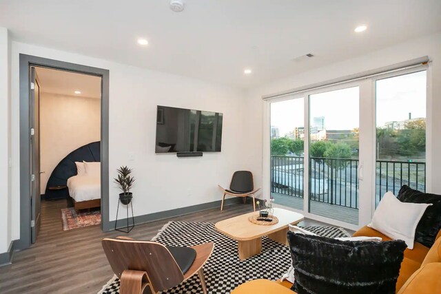 living room featuring dark wood-type flooring