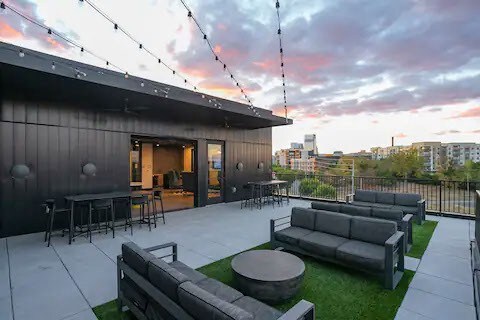 patio terrace at dusk with outdoor lounge area