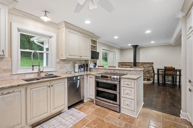 1780 Molly Hollow Rd, Nolensville, TN 37135 - kitchen with backsplash, sink, kitchen peninsula, and stainless steel appliances