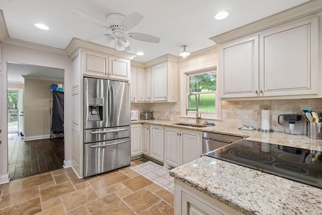 1780 Molly Hollow Rd, Nolensville, TN 37135 - kitchen featuring sink, ceiling fan, decorative backsplash, light stone counters, and stainless steel appliances