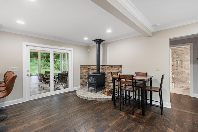 1780 Molly Hollow Rd, Nolensville, TN 37135 - dining area featuring ornamental molding, a wood stove, dark wood-type flooring, and beam ceiling