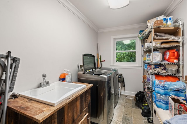 1780 Molly Hollow Rd, Nolensville, TN 37135 - laundry room featuring washing machine and clothes dryer, crown molding, and sink