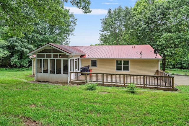 1780 Molly Hollow Rd, Nolensville, TN 37135 - back of house with a wooden deck, a lawn, and a sunroom