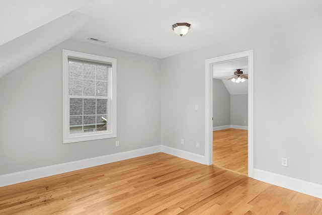 bonus room featuring ceiling fan, wood-type flooring, and vaulted ceiling