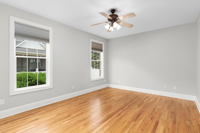 unfurnished room featuring light hardwood / wood-style flooring and ceiling fan