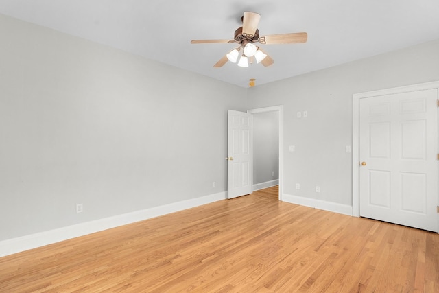 unfurnished bedroom with light hardwood / wood-style flooring and ceiling fan