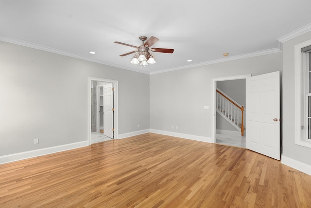 unfurnished room with ceiling fan, light hardwood / wood-style floors, and ornamental molding