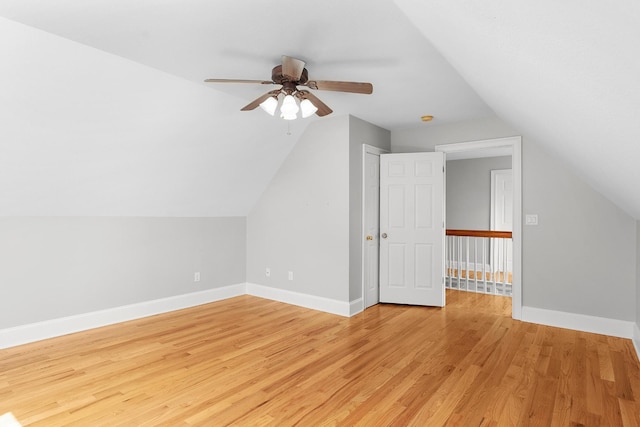 bonus room with ceiling fan, light hardwood / wood-style flooring, and lofted ceiling