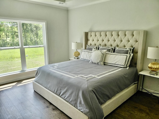 7140 Maddenwood Ln, Hermitage, TN 37076 - bedroom featuring wood finished floors, crown molding, and visible vents