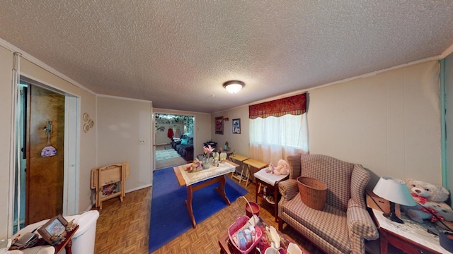 living room with dark parquet flooring, a textured ceiling, and ornamental molding