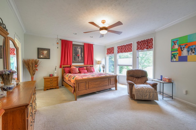 bedroom featuring ceiling fan, crown molding, a textured ceiling, and light carpet