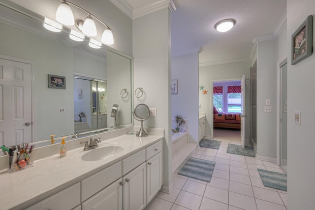 bathroom with tile patterned flooring, vanity, ornamental molding, and a textured ceiling