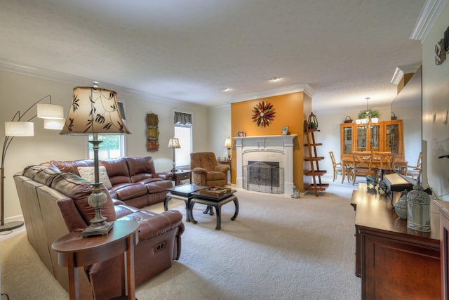 living room with a tile fireplace, crown molding, light colored carpet, and a textured ceiling