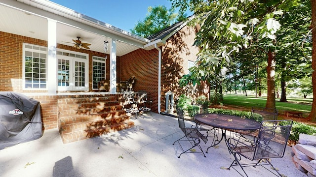 view of patio / terrace with ceiling fan and grilling area