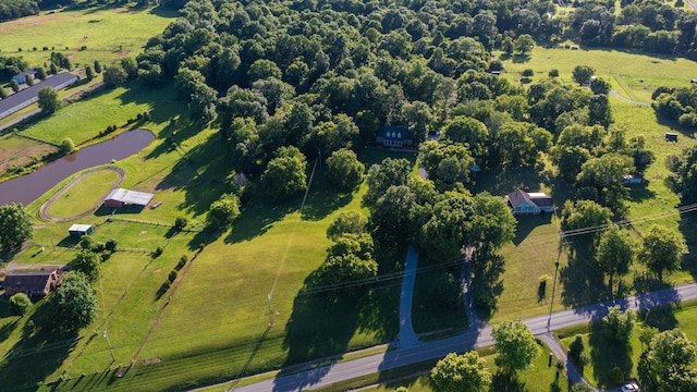 aerial view featuring a rural view and a water view