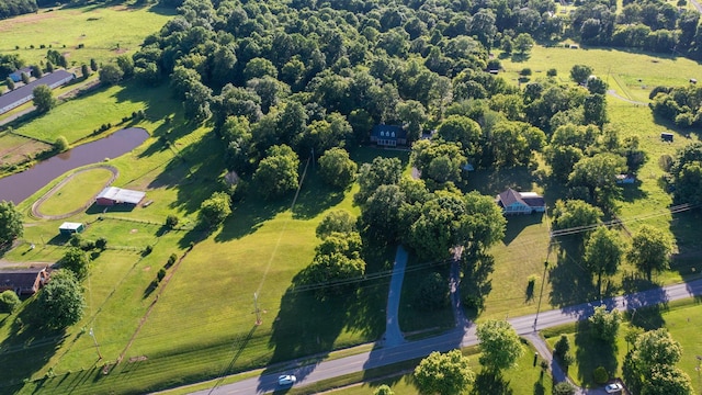 bird's eye view featuring a rural view and a water view