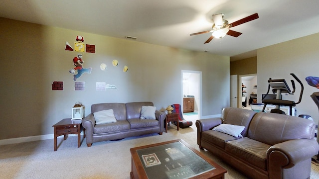 living room featuring light carpet and ceiling fan