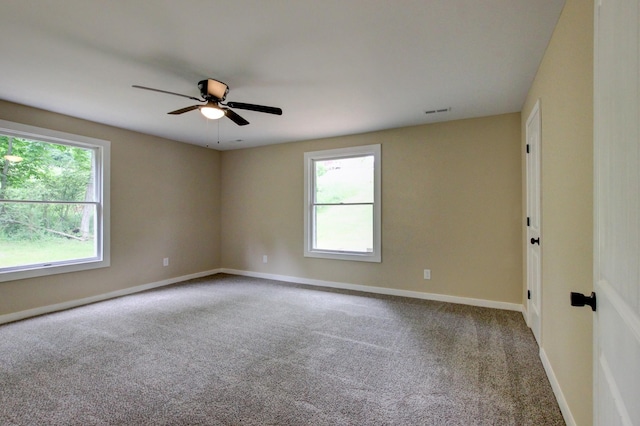 carpeted empty room with ceiling fan