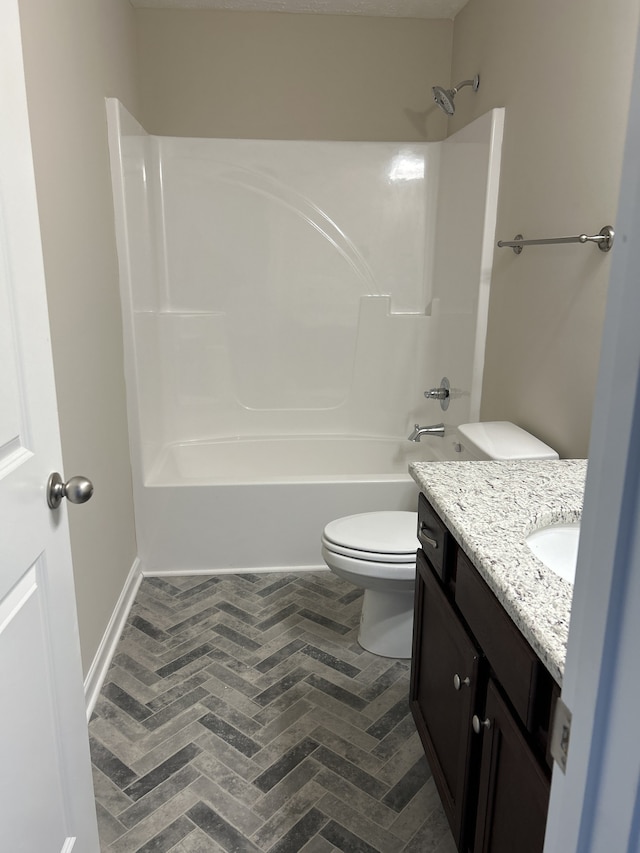 full bathroom featuring vanity, toilet, and  shower combination