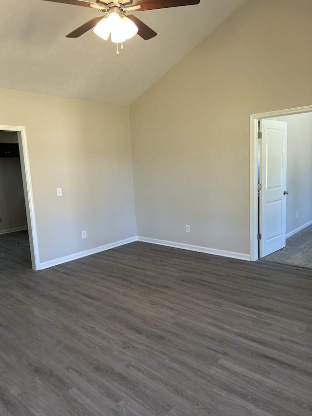 unfurnished room featuring dark hardwood / wood-style floors, ceiling fan, and lofted ceiling