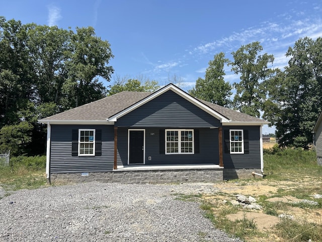 single story home with covered porch