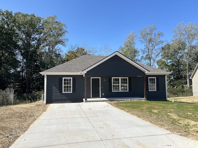 ranch-style home with a front yard