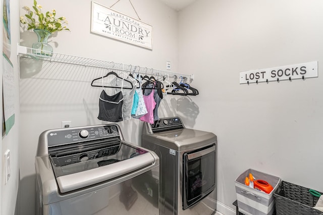 clothes washing area with independent washer and dryer