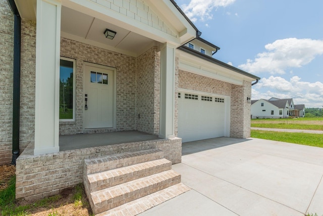 doorway to property featuring covered porch