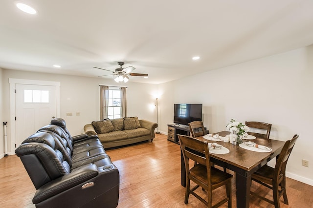 living area featuring recessed lighting, wood finished floors, a ceiling fan, and baseboards