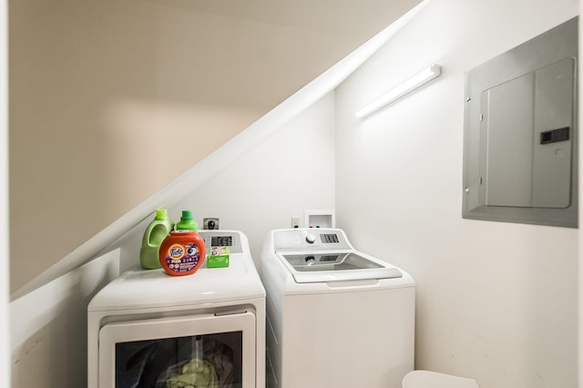 laundry area featuring washing machine and dryer, laundry area, and electric panel