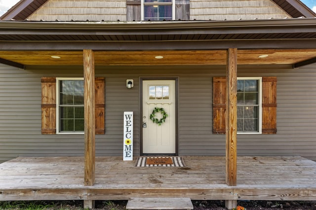 property entrance with covered porch