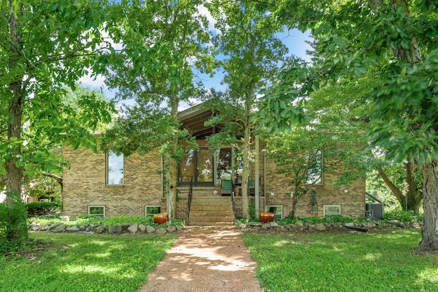 view of front of home with a front yard