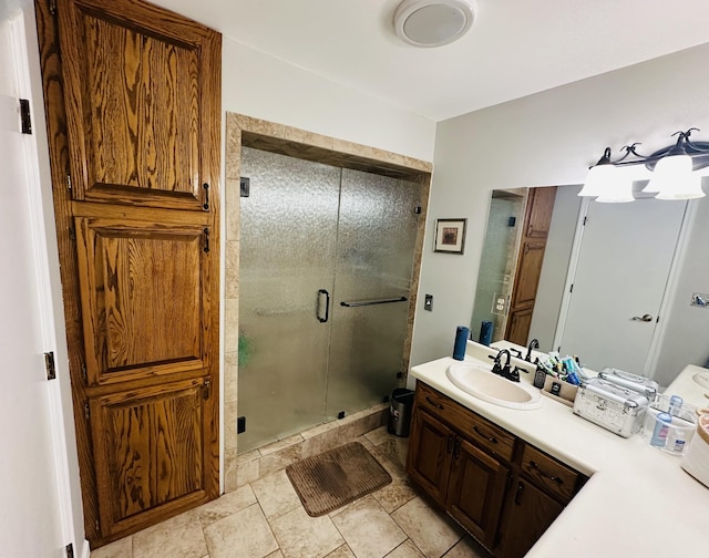 bathroom with vanity and an enclosed shower