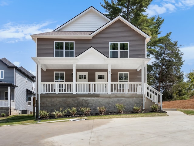 view of property featuring a porch