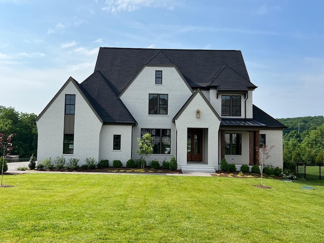 view of front of property with a front lawn