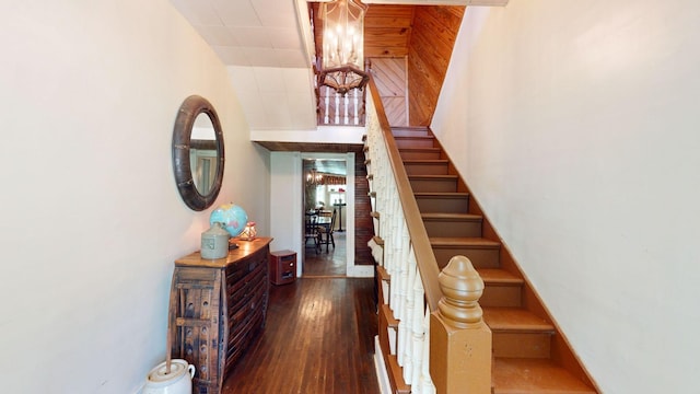 interior space featuring a chandelier and wood-type flooring