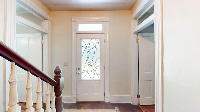 foyer featuring dark hardwood / wood-style floors