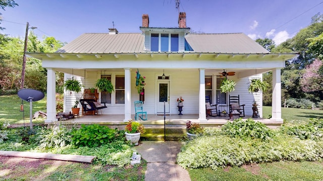 rear view of house with a porch