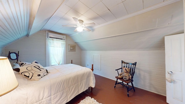 bedroom featuring vaulted ceiling, ceiling fan, a wall mounted air conditioner, and dark hardwood / wood-style floors