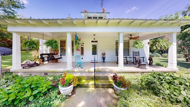 view of patio with covered porch and ceiling fan