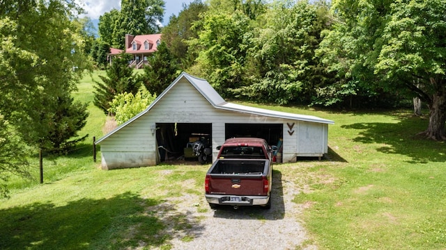 garage with a yard